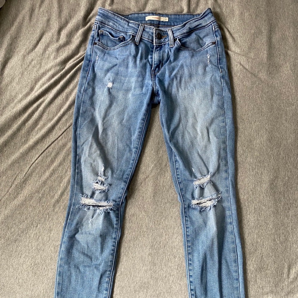 Women’s distressed Levi’s